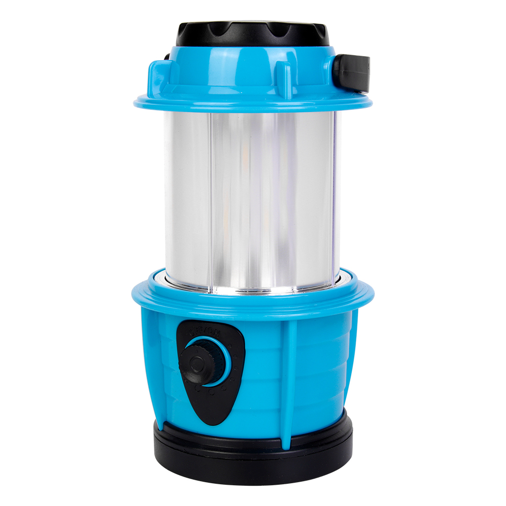 Direct front view of the blue retro camping lantern highlighting the smooth reflective interior cylinder without active light bulbs.