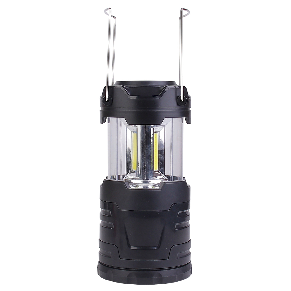 The opened collapsible LED camping lantern shown with its two stainless steel wire handles raised, highlighting the portability feature.