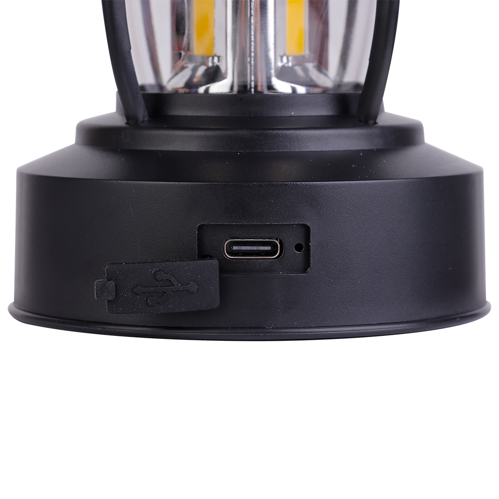 Close-up view of the base showing an opened rubber dust plug exposing the built-in USB Type-C input port for fast charging.