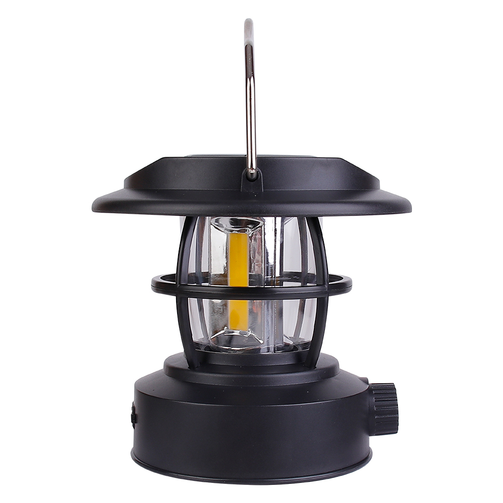 Side profile view of the solar vintage camping lantern with the metal handle upright, showcasing the sleek interface and protective iron cage.