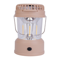 Direct front view of the light brown camping lantern on a white background with its top fan folded flat, showing the clear dome and vertical retro filaments.