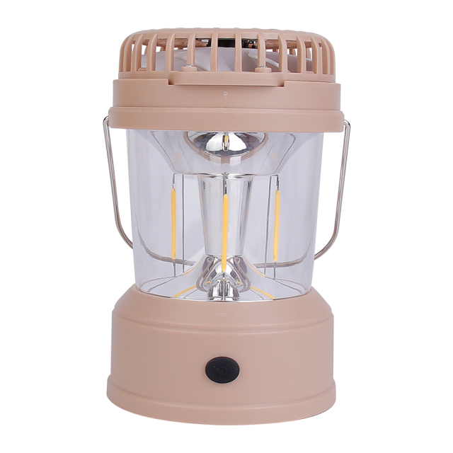 Direct front view of the light brown camping lantern on a white background with its top fan folded flat, showing the clear dome and vertical retro filaments.