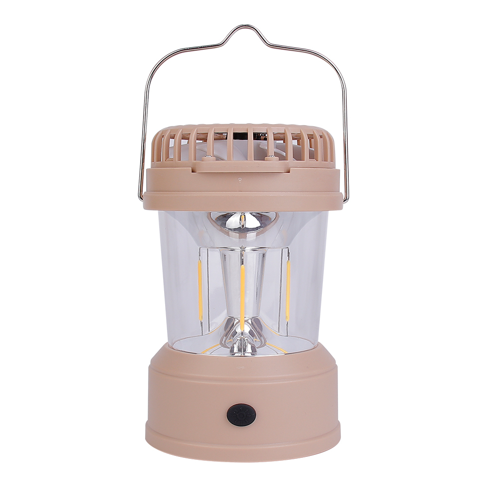 Front view of the light brown camping fan lantern on a white background with its metal wire hanging handle raised upright and top fan folded.