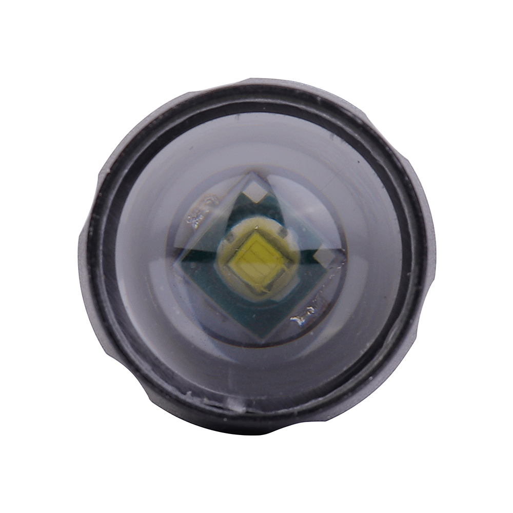 A front close-up view looking directly into the flashlight head, showing the optical convex lens and 3W XPE LED emitter.