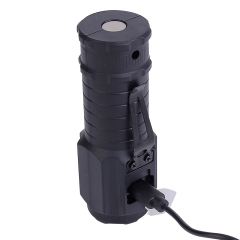 The black mini LED flashlight standing upright while connected to a Type-C USB charging cable.