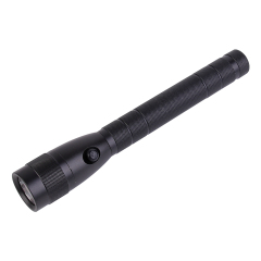 An angled view of a medium-sized black aluminum flashlight lying on a white background.