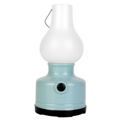 Front view of the light blue vintage LED camping lantern with a frosted white shade.