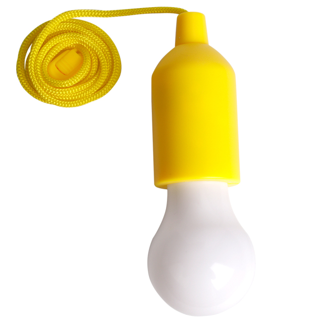 A yellow LED pull cord light with a frosted white bulb and its long hanging lanyard neatly rolled up.