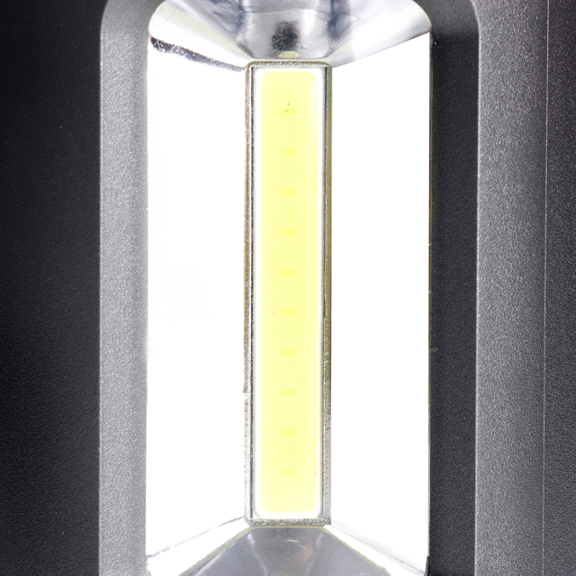 Macro view of the internal yellow COB LED light strip and reflector inside the lantern.