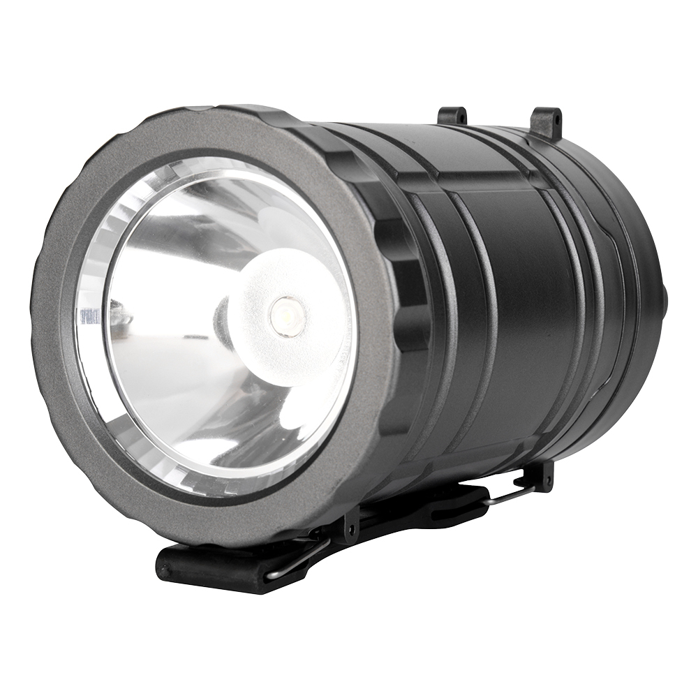 Close-up view of the bottom flashlight searchlight lens and reflector cup on the collapsible lantern.