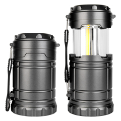 Side-by-side comparison of the dark grey camping lantern in its collapsed state and extended open state.