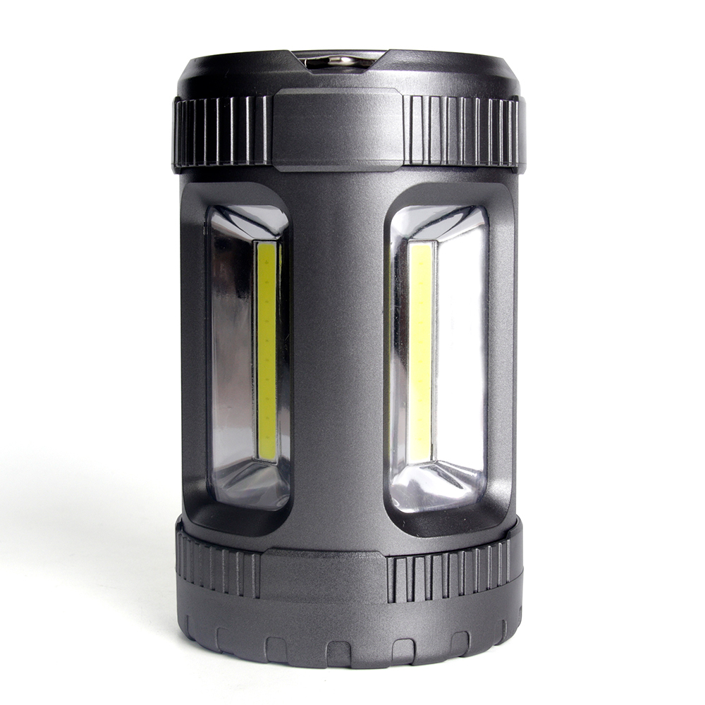 Side angle view of the black cylindrical COB camping lantern showing multi-directional light output.
