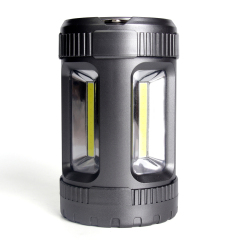Side angle view of the black cylindrical COB camping lantern showing multi-directional light output.