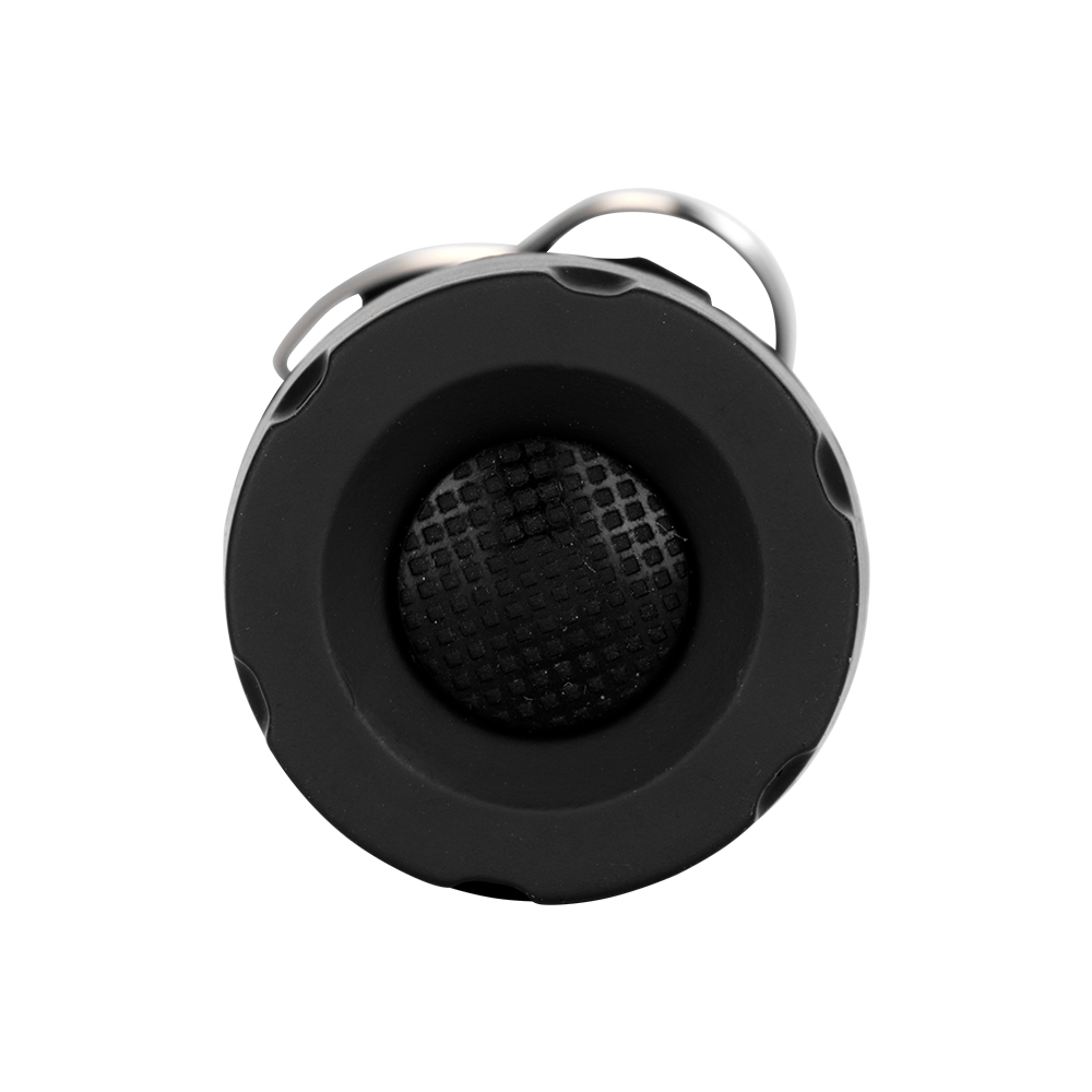 Bottom view of the black telescopic LED flashlight showing the rubberized push-button power switch.