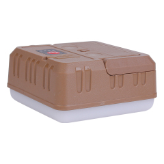 Side view of a brown portable LED camping work light with its handle folded down.