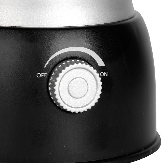 Close-up view of the rotary dimmer switch with OFF and ON markings on the lantern base.