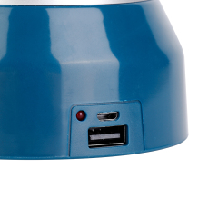 Close-up view of the USB charging port, indicator light, and power bank output port on the lantern base.