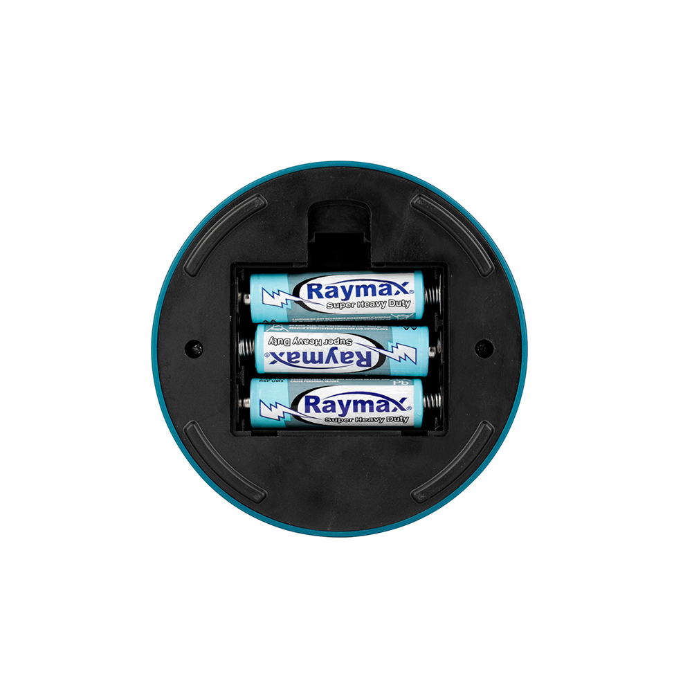 Bottom-up view of the battery compartment fitted with three AA batteries inside the lantern.