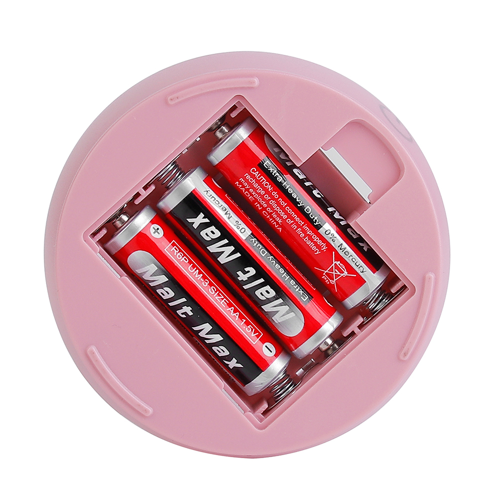 Bottom-up view of the battery-powered LED lantern showing the open battery compartment with AA batteries.