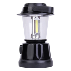 Side view of the COB camping lantern with its top handle folded down along the side.