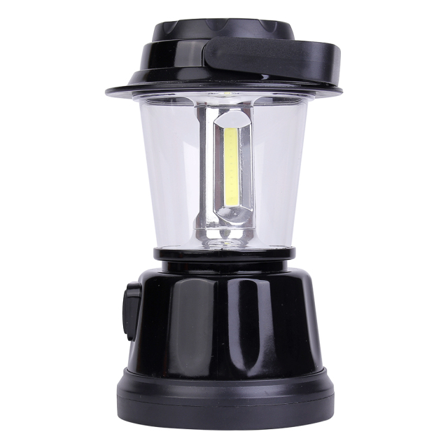 Side view of the COB camping lantern with its top handle folded down along the side.