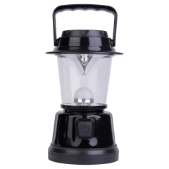 Front view of the portable LED camping lantern with its handle raised for hanging.