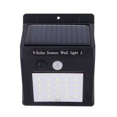 Front view of a solar motion sensor outdoor wall light with integrated solar panel and sensor.