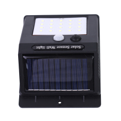 Top-down view highlighting the solar charging panel of the outdoor wall light.