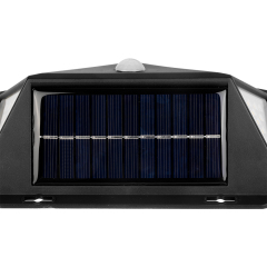 Close-up view of the top solar charging panel and mounting bracket of the outdoor wall light.