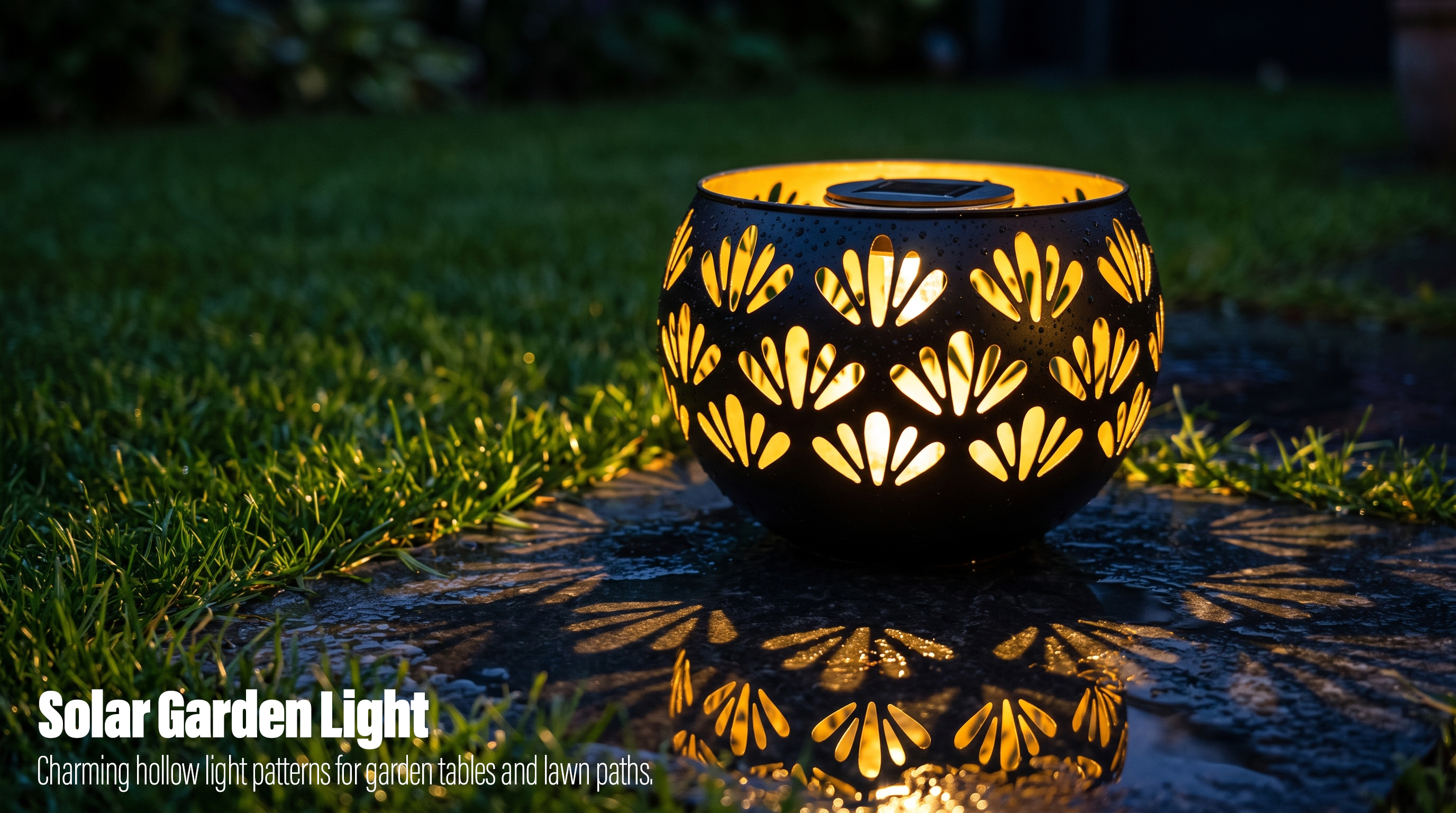 A black solar garden light glowing warmly and casting decorative fan-shaped shadow patterns on a wet lawn stone at night.