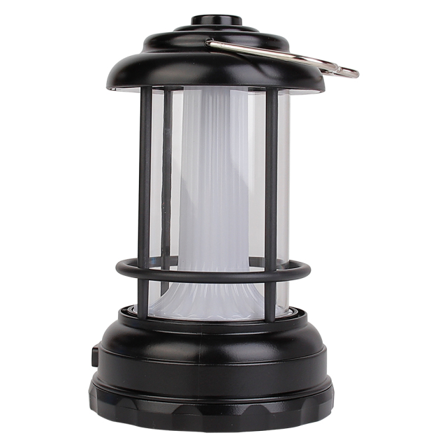 Perspective view of the black vintage camping lantern featuring a push button control and top hanging ring.