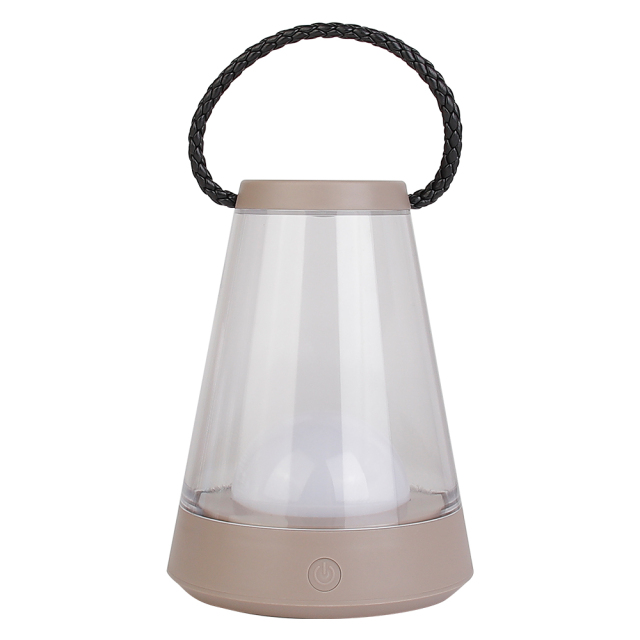 Front view of a portable LED camping lantern featuring a brown base, transparent shade, and top carrying handle.