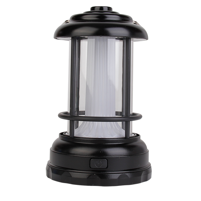 Front view of a classic black vintage LED camping lantern with a front push button switch.