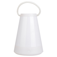 Front view of a white portable LED camping lantern with a frosted white diffuser and matching white handle.