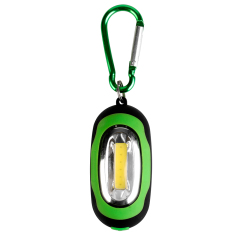 Front view of a green oval COB LED keychain light with a metal carabiner clip.