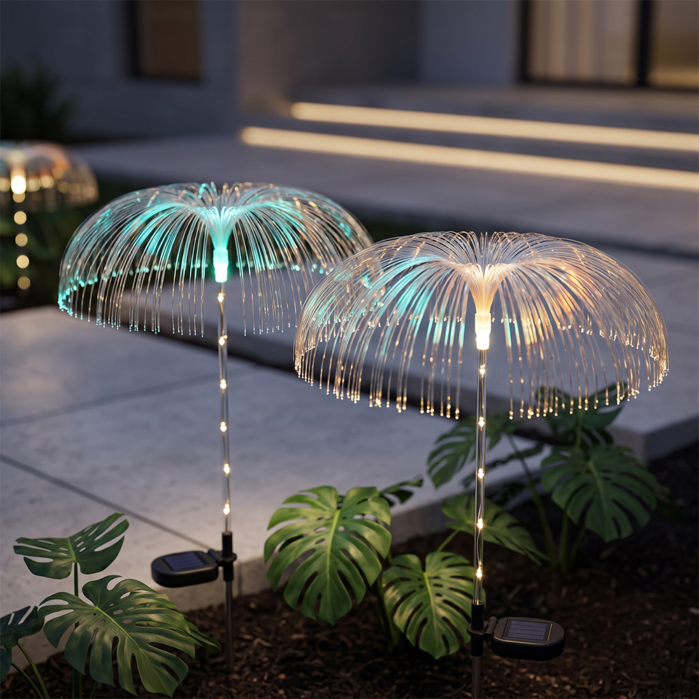 Solar optical fiber jellyfish lights with warm light reflections among monstera plants next to a set of stairs.