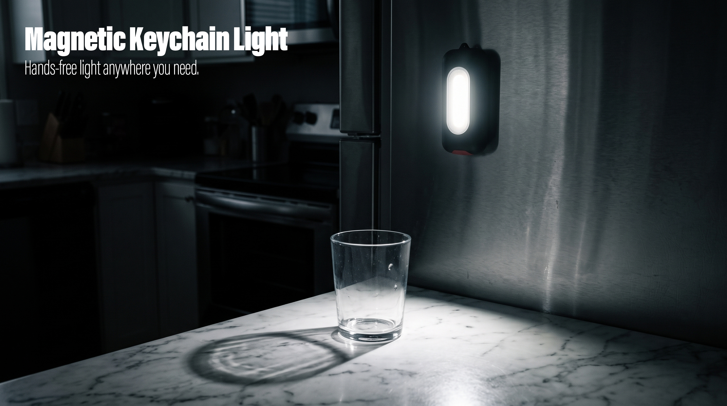 A magnetic keychain light attached to a metal fridge illuminating a glass in a dark kitchen.