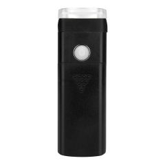 Top view of an LED bike front light showing its power switch button.