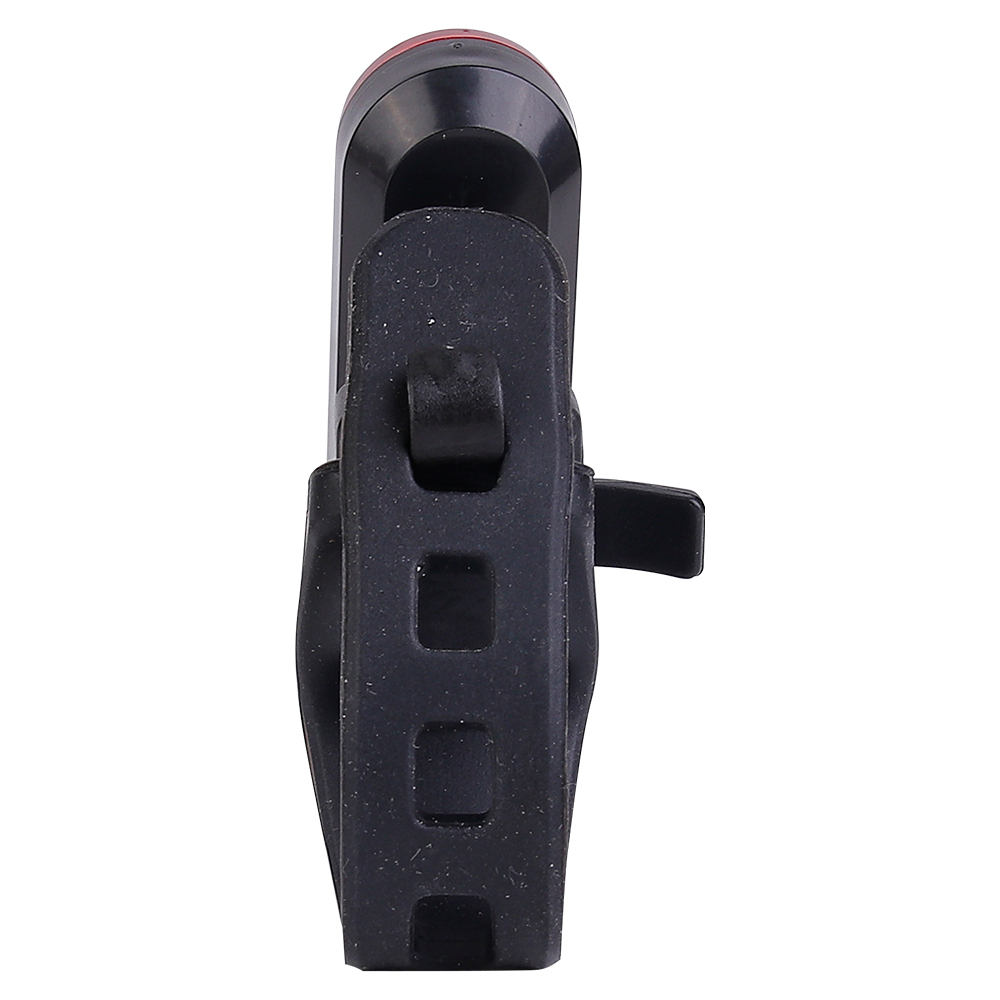 Back view of an LED bike rear light showing its adjustable silicone mounting clip.