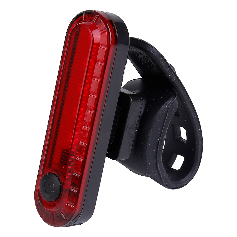 Angled view of a red LED bike rear light with a flexible silicone mounting strap.