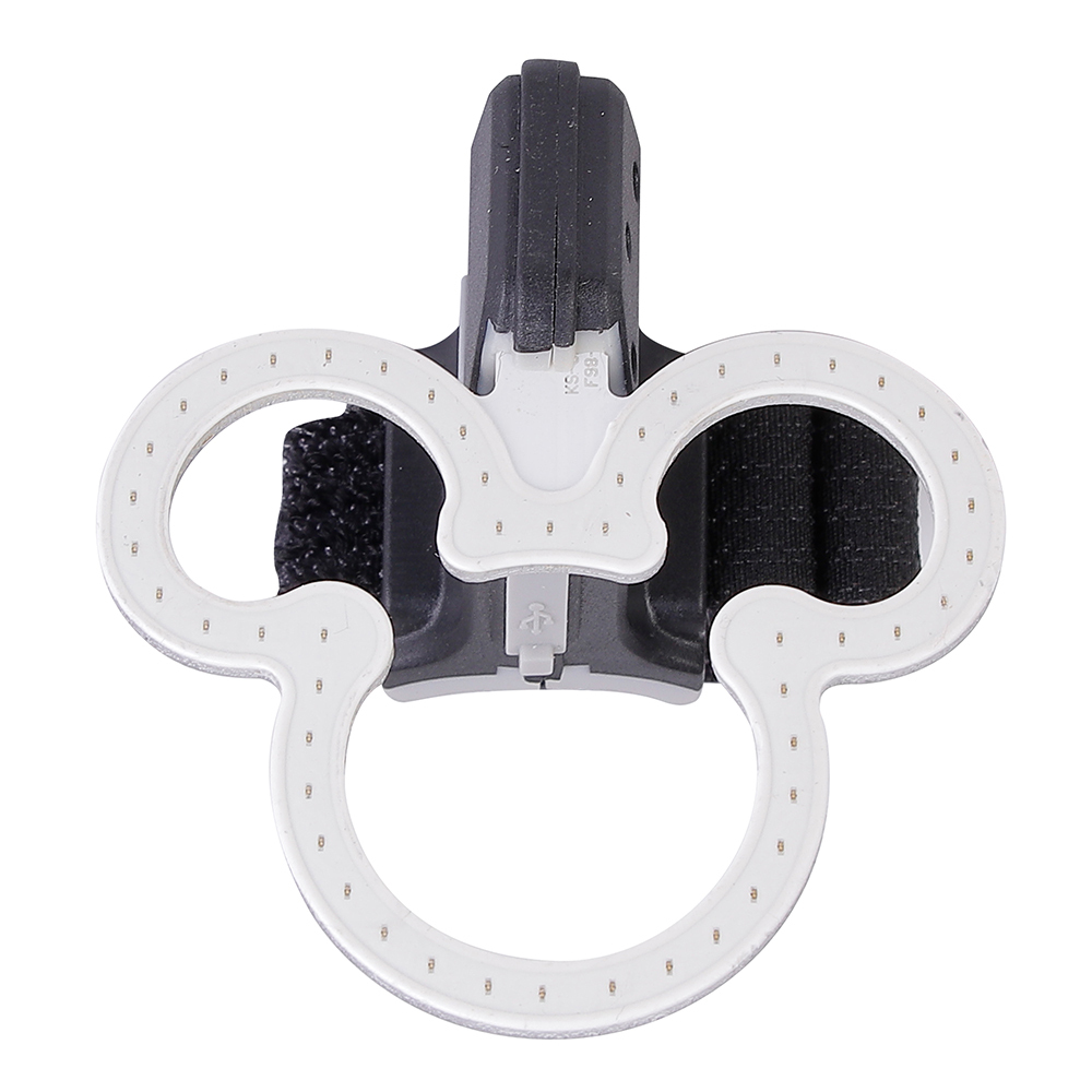 Front view of a white cartoon-shaped rechargeable LED bike rear light.