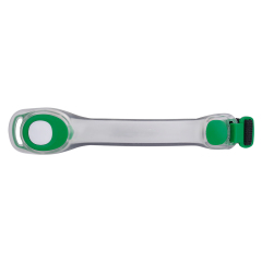 Flat view of an LED silicone safety light showing the flexible body and strap.