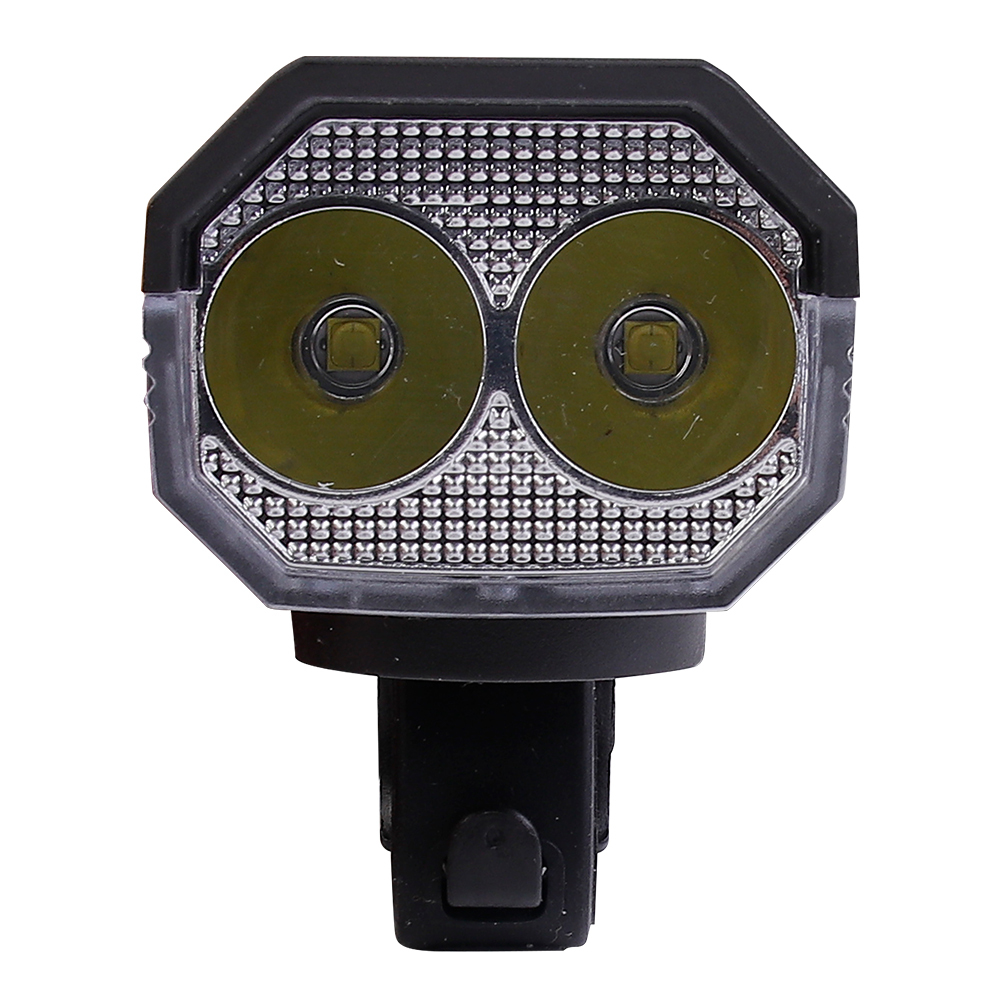 Close-up front view of a bicycle headlight showing two XTE LED lenses.