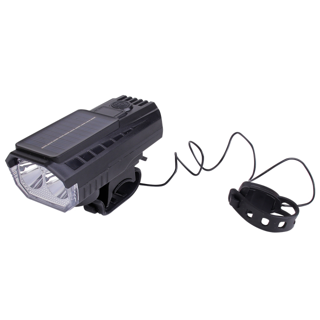 Angled view of a solar-powered LED bike light with an attached electronic horn switch.