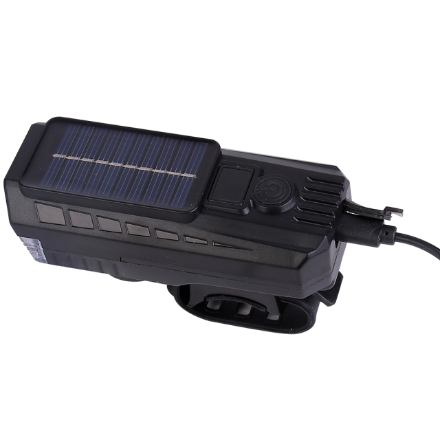 Close-up of the Type-C USB charging port on a solar-powered bike front light.