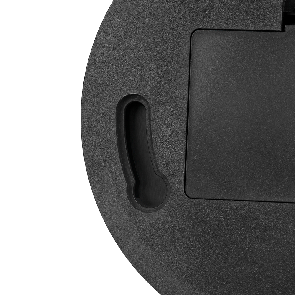 Close-up view of the mounting keyhole and battery compartment cover on the dummy camera base.