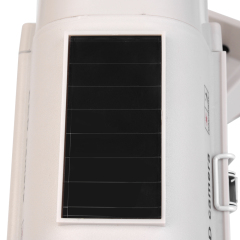 Close-up detail of the solar panel on top of a fake security camera housing.