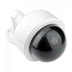 Close-up view of the black dome and realistic camera lens on a white fake outdoor security camera.