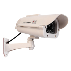 Side view of a silver fake outdoor security camera with adjustable wall mount bracket.