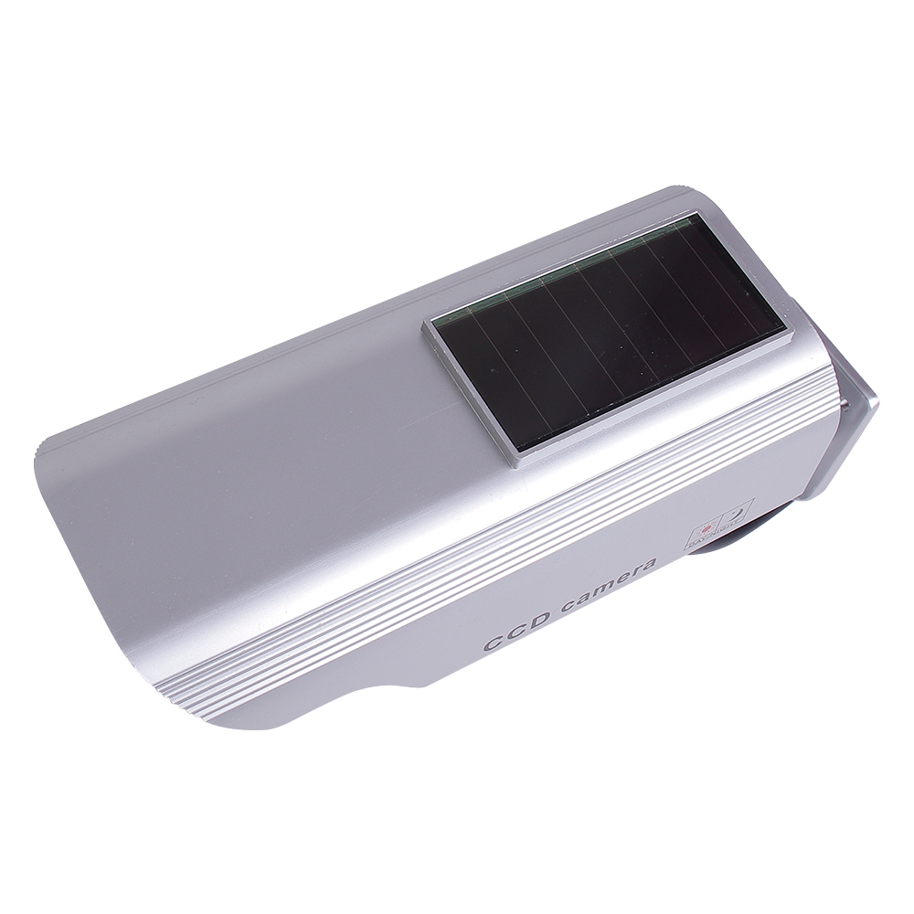 Top angled perspective view of a silver solar-powered dummy security camera housing.